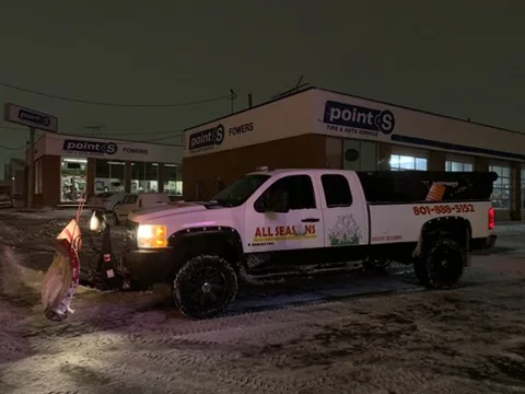The All Seasons plow truck out on a night snow run